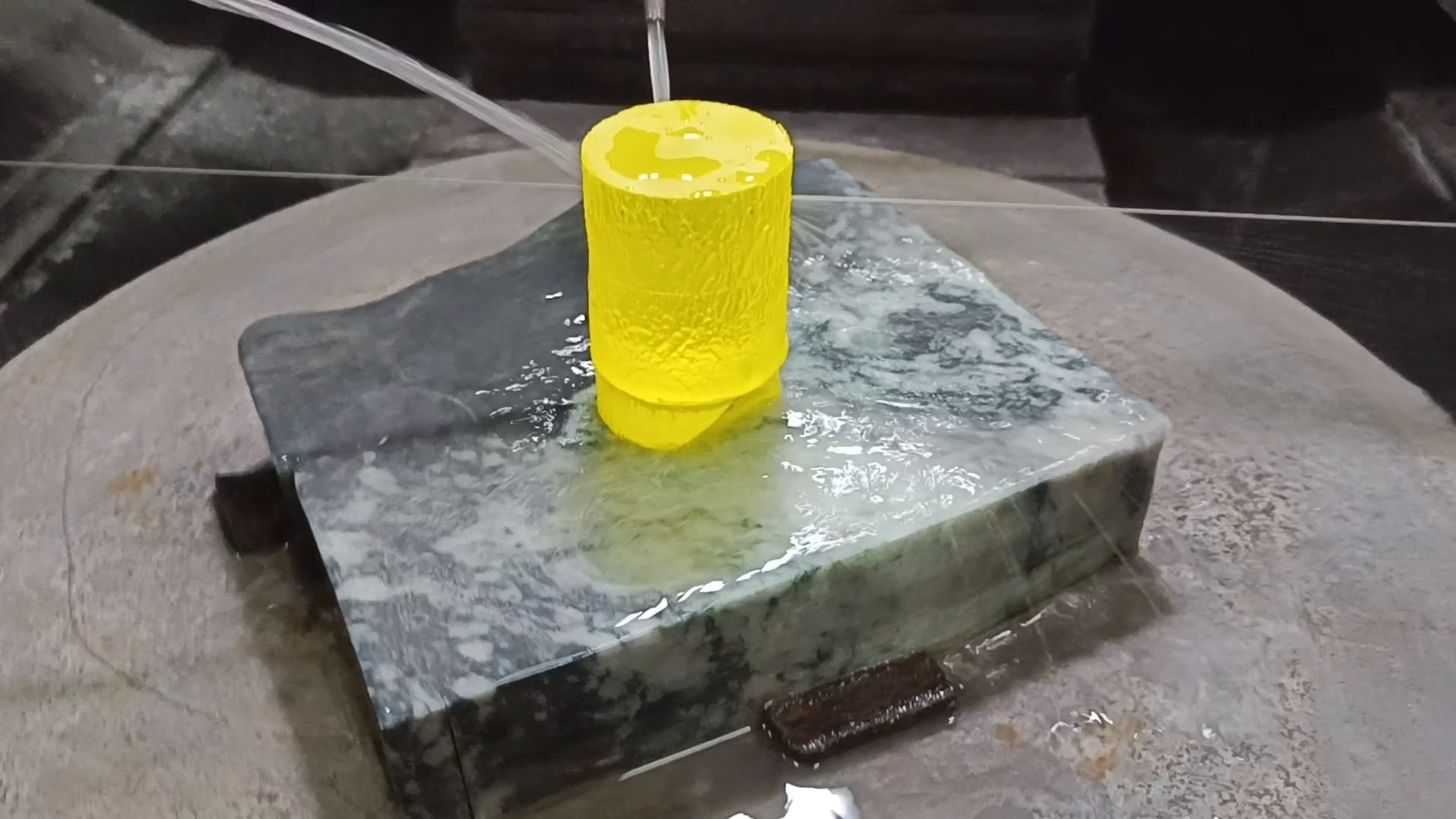 Diamond wire loop cutting of colored crystals