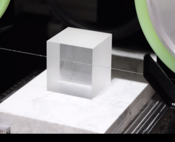 H-K9L optical glass block being cut with an endless diamond wire