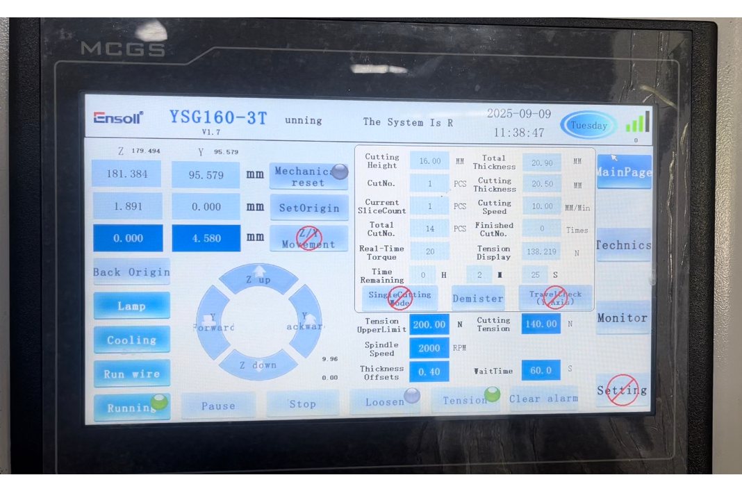 Machine control panel during the optical glass slicing test, showing the cutting speed, cutting wire tension and torque settings used in the run