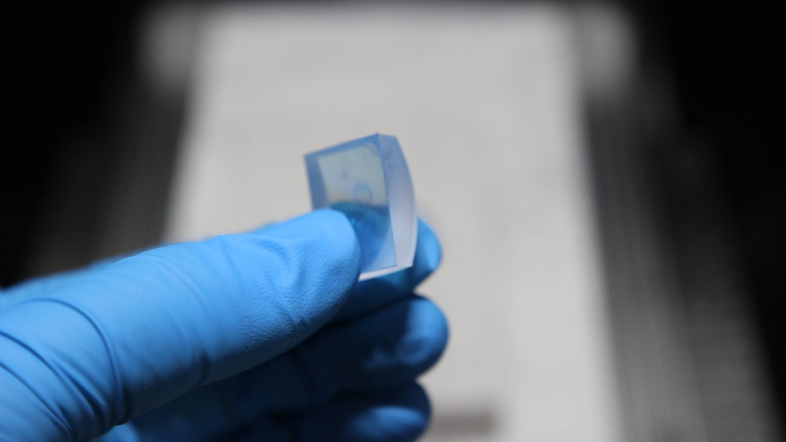 Optical glass sections cut to 15 mm length from a 30.5 mm diameter rod by diamond wire loop slicing